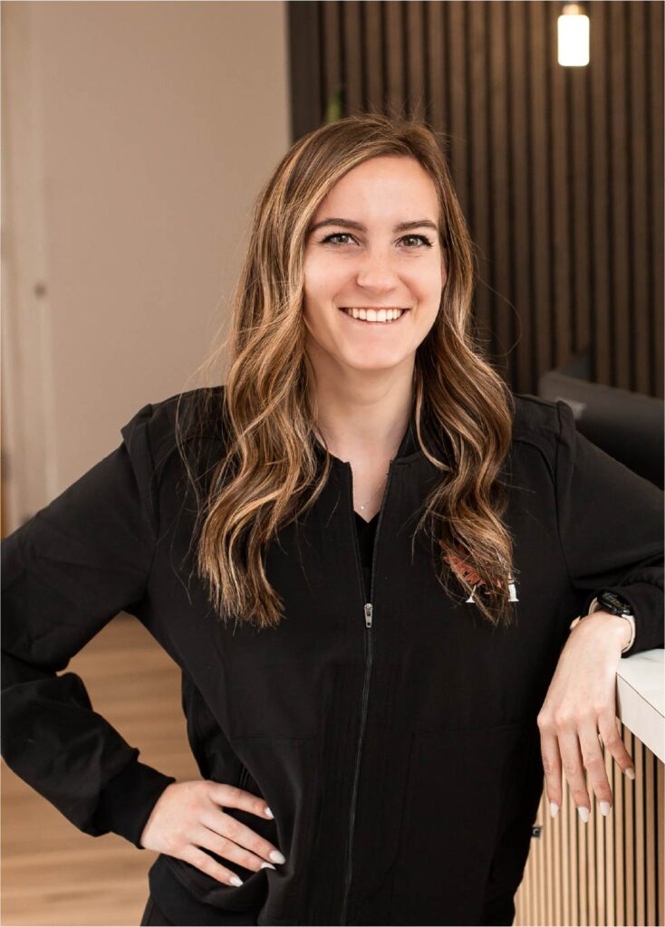 Kaitlin Matthew standing at Ascent Med Spa