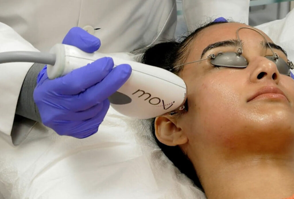 Woman receiving MOXI on her cheek